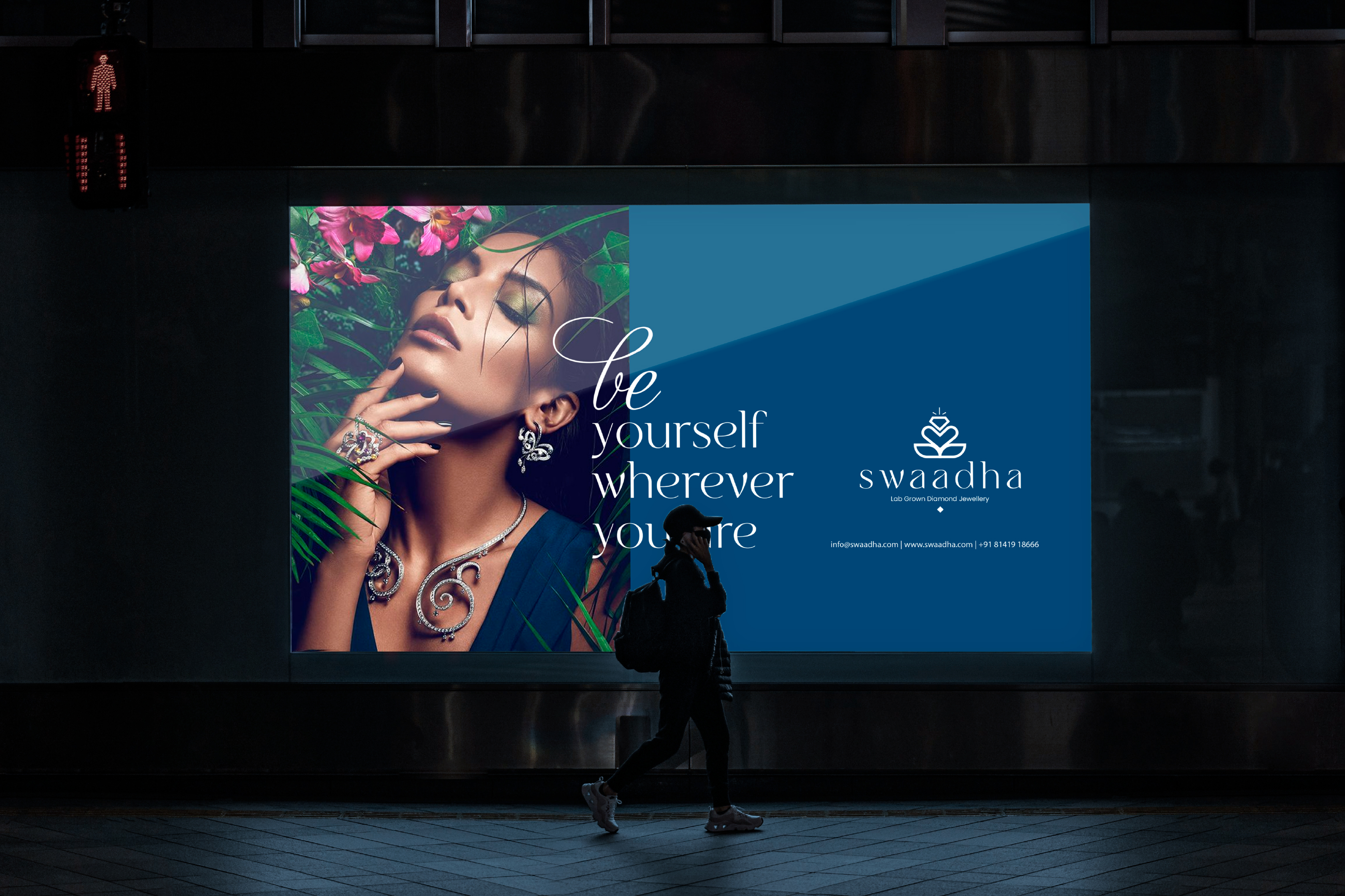 Swaadha outdoor billboard mockup at night with pedestrian and brand contact details